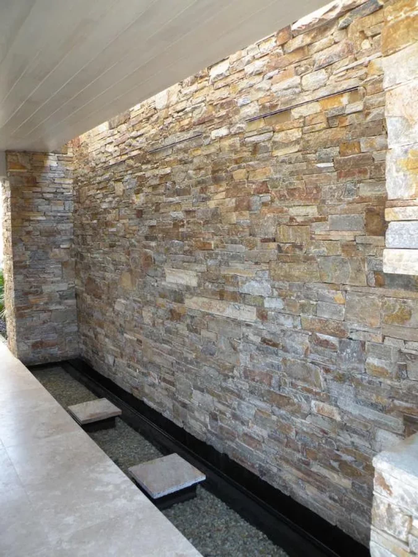 Completed Toodyay Stone feature wall with water feature and stepping stones